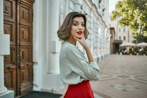 woman outdoors near building red lips walk photo