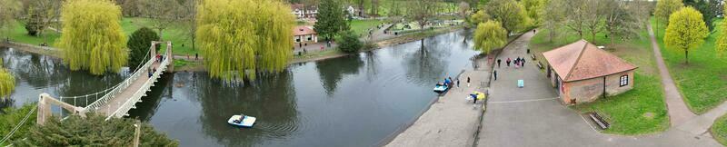 Ultra Wide Panoramic High Angle View of Luton City of England. Aerial View of Town was Captured on 17-April-2023 with Drone's Camera from Low Altitude. photo