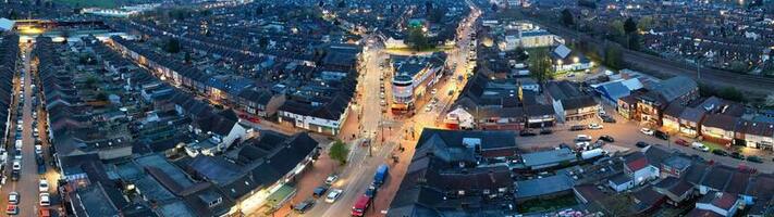 Ultra Wide Panoramic High Angle View of Luton City of England. Aerial View of Town was Captured on 17-April-2023 with Drone's Camera from Low Altitude. photo