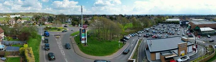 Ultra Wide Panoramic High Angle View of Luton City of England. Aerial View of Town was Captured on 17-April-2023 with Drone's Camera from Low Altitude. photo