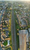 Ultra Wide Panoramic High Angle View of Luton City of England. Aerial View of Town was Captured on 17-April-2023 with Drone's Camera from Low Altitude. photo