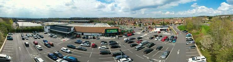 Ultra Wide Panoramic High Angle View of Luton City of England. Aerial View of Town was Captured on 17-April-2023 with Drone's Camera from Low Altitude. photo