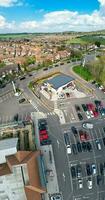 Ultra Wide Panoramic High Angle View of Luton City of England. Aerial View of Town was Captured on 17-April-2023 with Drone's Camera from Low Altitude. photo