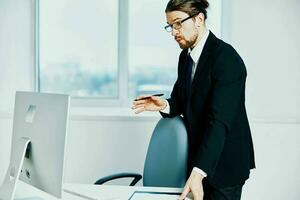 man in a suit in a suit office work phone technologies photo