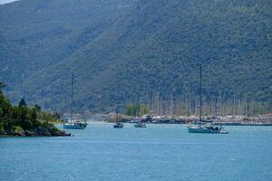 Sailboats in Nydri harbour at Lefkada island, Greece photo