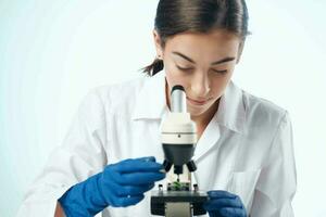 woman laboratory assistant microscope microbiology research photo