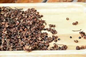 A pile of Sichuan pepper seeds photo