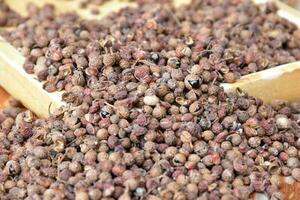 A pile of Sichuan pepper seeds photo