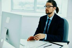 office worker with glasses self-confidence work computer photo