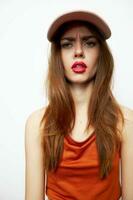 Emotional woman in a cap With an open mouth, a daring look attractive look photo