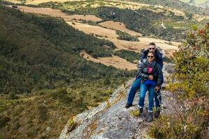 Young couple exploring nature at a beautiful paramo at the department of Cundinamarca in Colombia photo