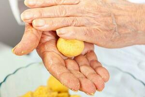 Preparation of the traditional dish from the Caribbean Coast in colombia called Arepa de Huevo or egg arepa photo