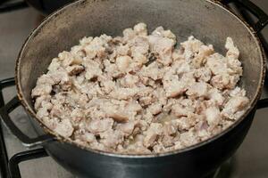 Pork cracklings preparation.  Plantain croquettes sttufed with pork cracklings. Marranitas or puerquitas photo