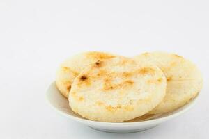 Roasted traditional Colombian white corn arepa photo