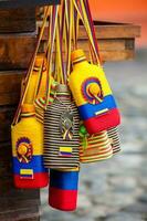 Liquor bottles normally used for traditional aguardiente decorated with the colors of the Colombian flag photo