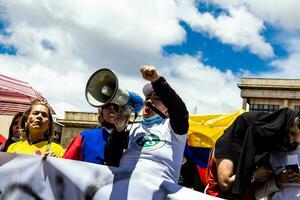 Bogota, Colombia, 2022. Peaceful protest marches in Bogota Colombia against the government of Gustavo Petro. photo