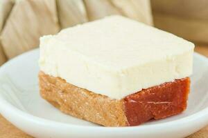 Traditional Colombian sweet from the Velez town in Santander called Bocadillo served with white cheese photo