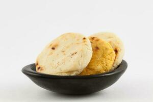 Roasted traditional South American corn arepa photo