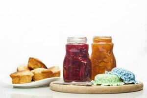 Homemade jams and bread photo