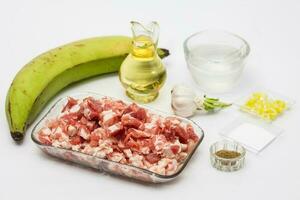 Preparation of plantain croquettes stuffed with pork cracklings photo