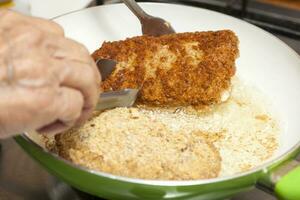 Frying a cordon bleu photo