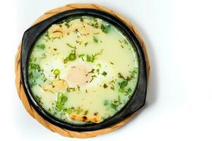 Traditional Colombian Poached Egg Soup called changua photo