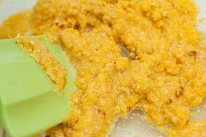 Traditional Colombian Arepa de Choclo Preparation. Sweet corn dough preparation photo