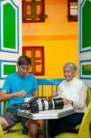 Tourists having coffee in Salento a beautiful small town located at the Quindio region in Colombia photo