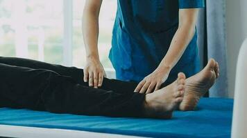 young asian physical therapist working with senior woman on walking with a walker video