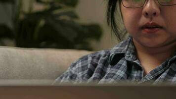 Close up young adult Asian woman, freelance data scientist work remotely at home coding programming on Big data mining, AI data engineering, Female typing on laptop. IT Technician. Telework concept. video
