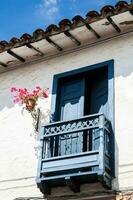 Beautiful balconies of the colonial houses at the small town of Santa Fe de Antioquia in Colombia photo