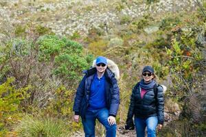 Young couple exploring nature at a beautiful paramo at the department of Cundinamarca in Colombia photo