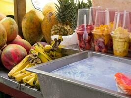 Street sell of fresh topical fruits at Cali city center photo