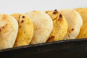 Roasted traditional South American corn arepa photo
