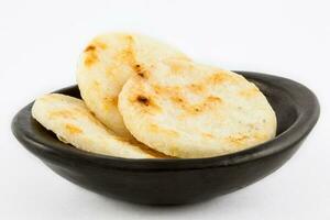 Roasted traditional Colombian white corn arepa photo