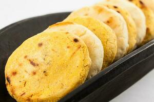 Roasted traditional South American corn arepa photo