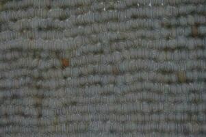 gray brown rock wall background, rock pattern on wall, rocks arranged in a panel on wall, blurred filter effect photo