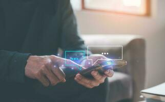 social online concept, man using smartphone chatting sending and reading text messages from internet network technology platform, social distancing, shopping, communication online photo