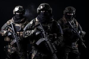 Portrait of three military men. A group of soldiers on black background. War operations, special forces. . photo