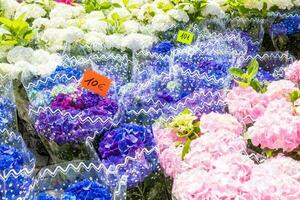 Flowers market on public street - agribusiness and flower shop. photo