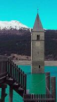Church steeple in Lake Reschen - Resia, South Tyrol, Italy video