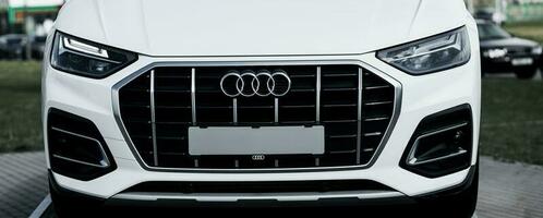 New white Audi Q5 front view. photo