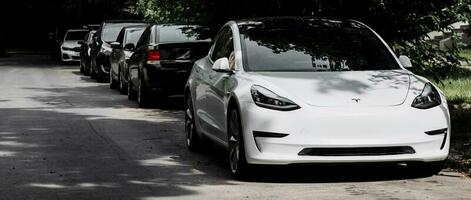 white Tesla Model 3 photo