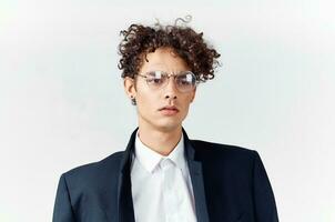 cute guy in a suit curly hair glasses fashion photo