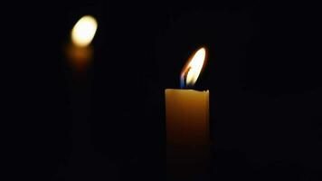 two Candles lighing in the dark after power cut video