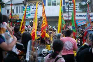 Ho Chi Minh city, Vietnam - 6 Feb 2023 Lunar New Year celebration - The dragon dance, beautiful colorful festive figure. Tet holiday background. Chinese Lunar New Year's Day, Spring Festival. photo