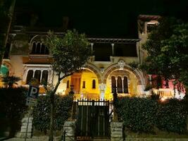 Coppede unusual style architechture district in roma buildings at night art nouveau liberty photo