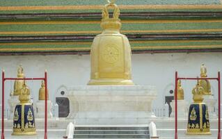 The golden bell at Wat Rakhang Kositaram Woramahawihan, an important tourist attraction of Thailand. photo