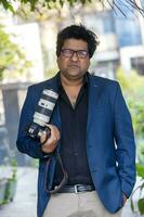 Bangladesh, January 24, 2018 An Outdoor portrait of the modern film director and screenwriter artist Dipankar Dipon at Banani, Dhaka. photo