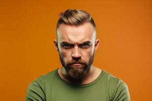 a man on solid color background photoshoot with Anger face experession photo